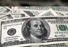 Dólar cae por impulso a toma de riesgos
