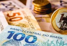 Real brasileño sube 4.5% frente al dólar tras primera vuelta entre Flávio Bolsonaro y Lula da Silva